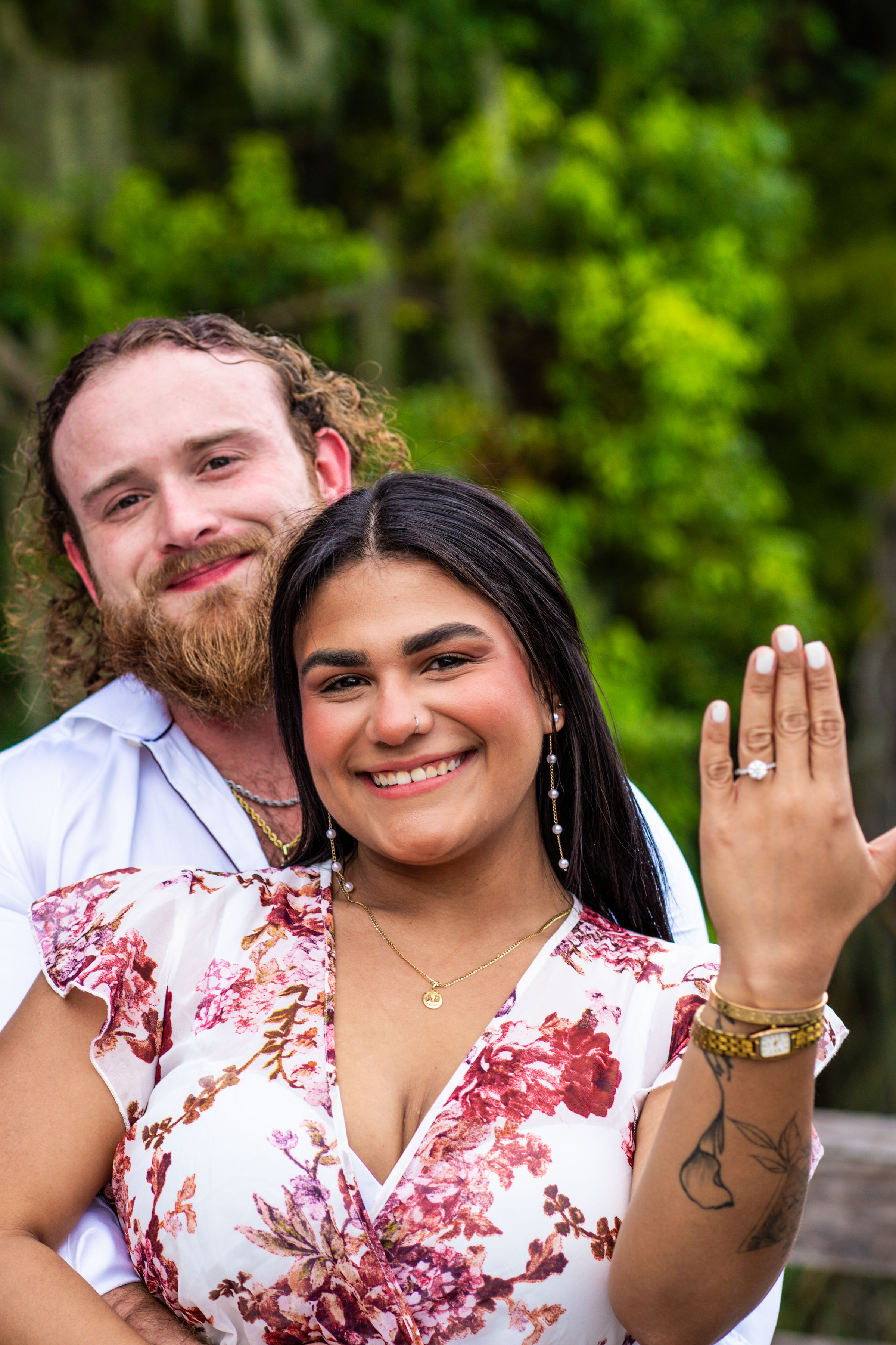 Ethan and Maria showing off the engagement ring