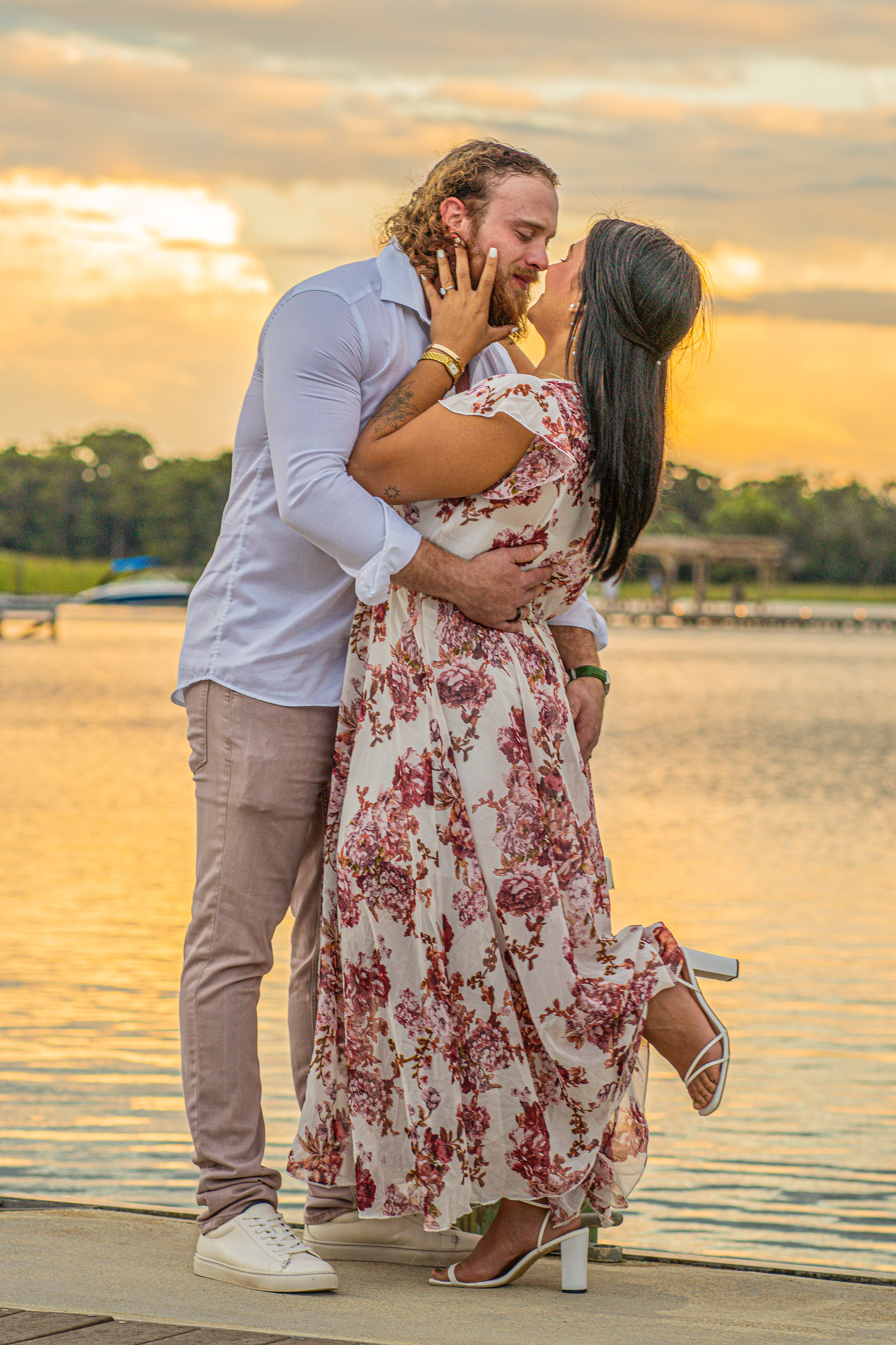 Ethan and Maria sunset kiss by the water